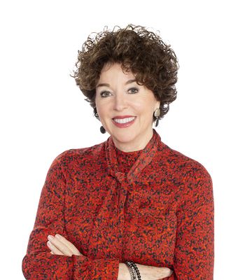 Portrait of Mitzi Gill, REALTOR®.